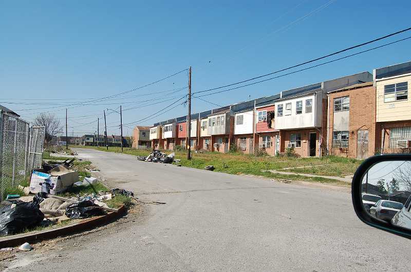 New Orleans 04-08-06 088.JPG - This appears to be the back-side of a housing project.  Totally abandoned.  It must've teemed with activity prior to Katrina.